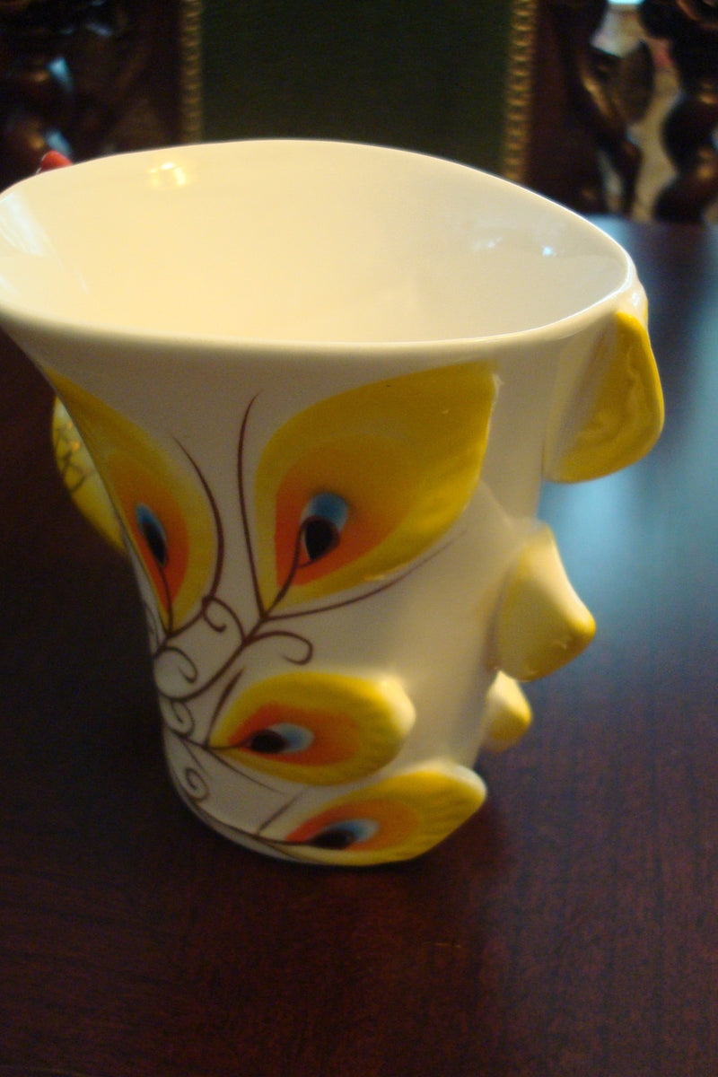 Beautiful cup and saucer from the Peacock Collection, cup ,saucer and spoon orig