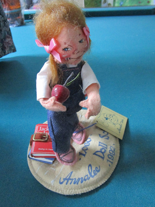 1992 Back To School Logo doll Kid Open eyes, looking to the side, closed mouth doll