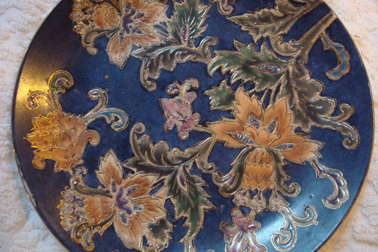 Chinese pottery plate blue background decorated with flowers and gold