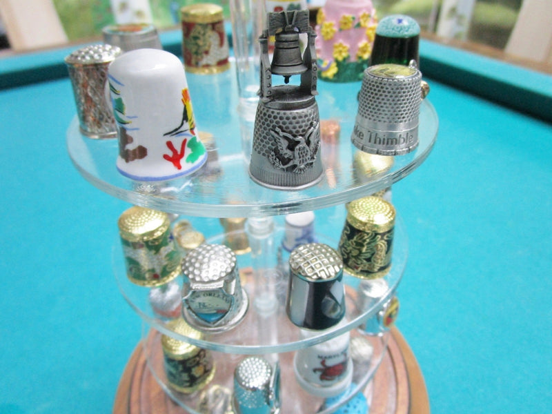 Thimbles Collection under glass dome, 43 assorted thimbles, dome is 11" tall[B]