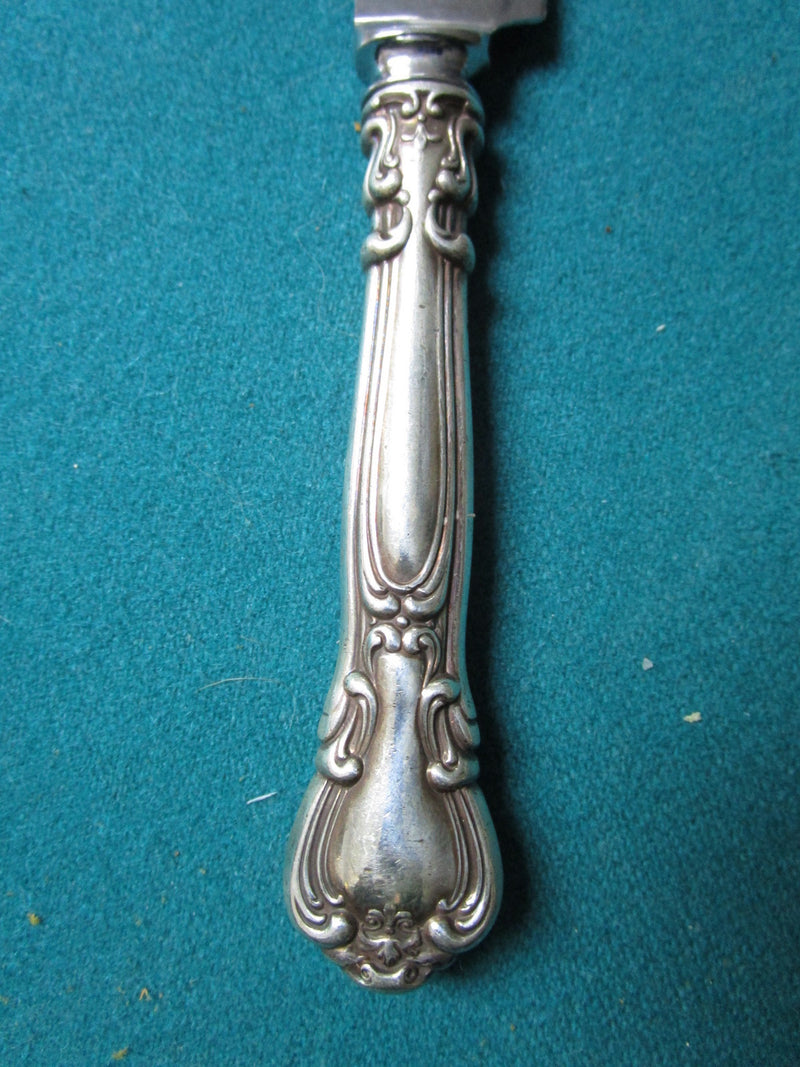 Sterling knife, silver handle