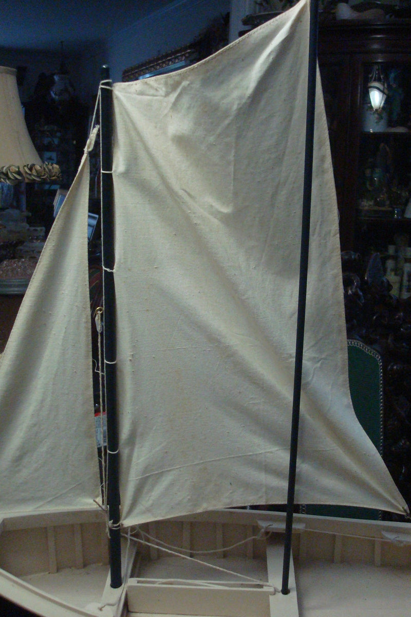 Sailing wooden boat 25' by 24" by 10"[11]