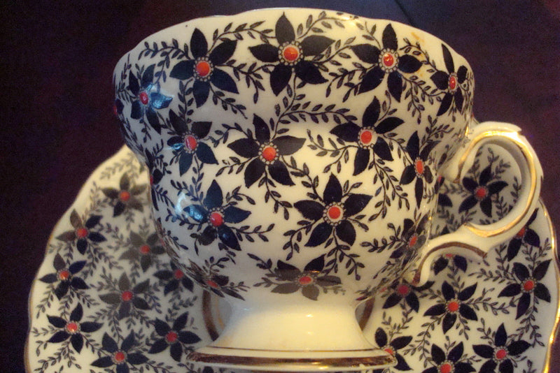 Rosina  Mid Century England  cup & saucer,black,flowers w/ touches of red [91]
