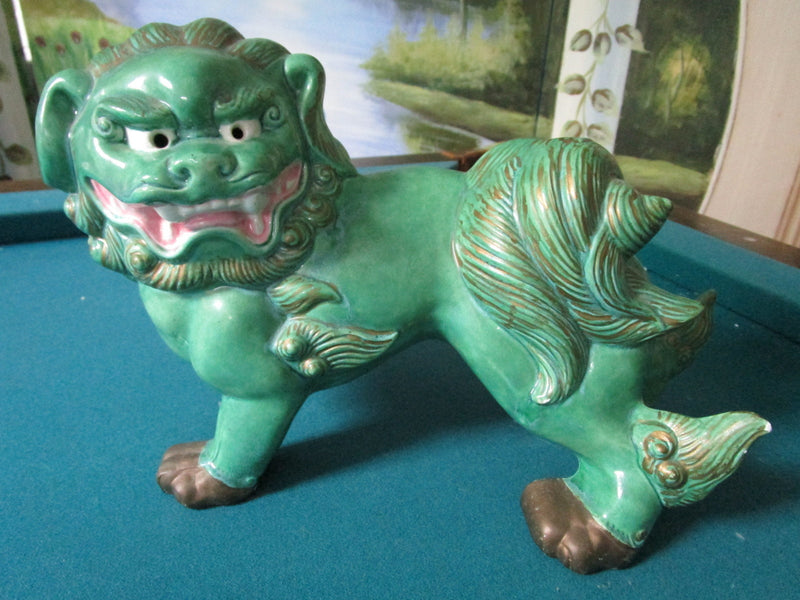 Foo dog by pottery studio signed Brian Lee, green, very detailed