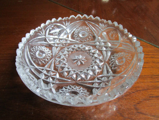 Cut glass candy dish, round saw borders, 6 1/2" diam