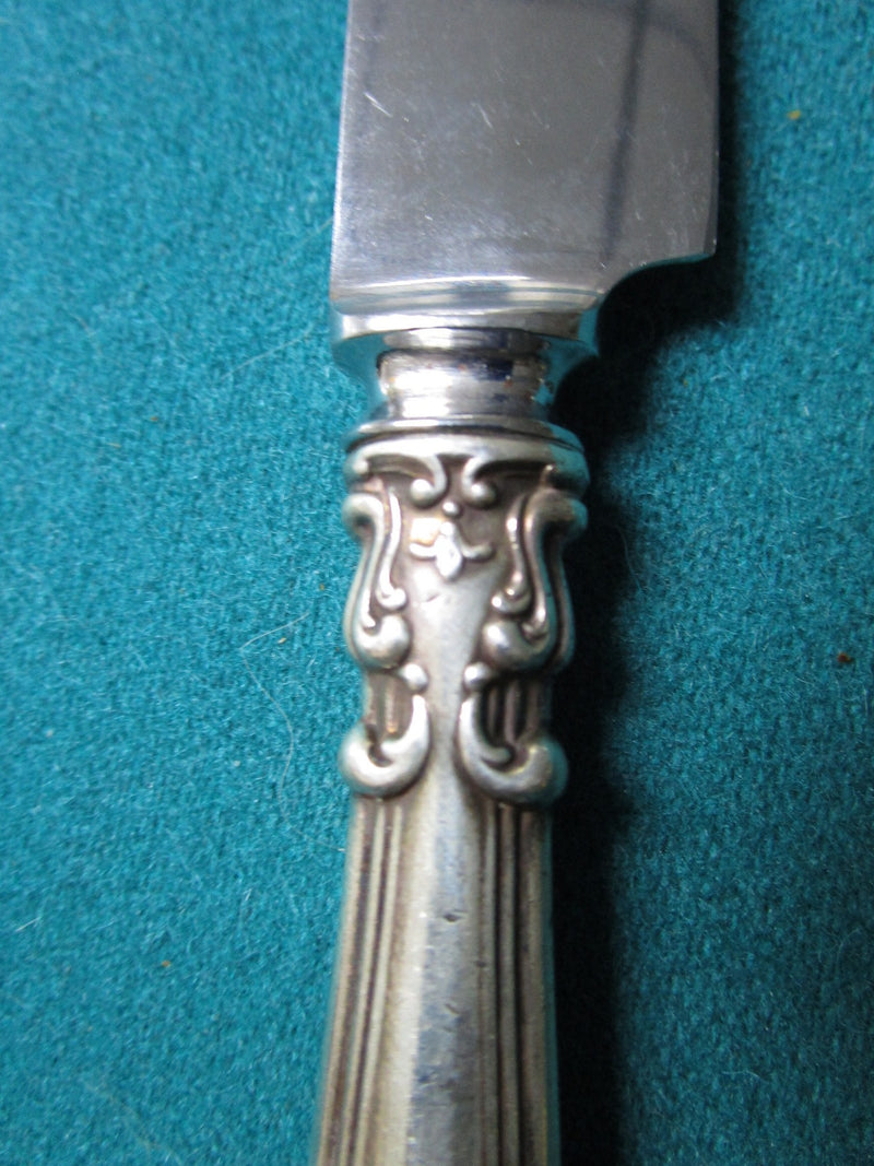 Sterling knife, silver handle