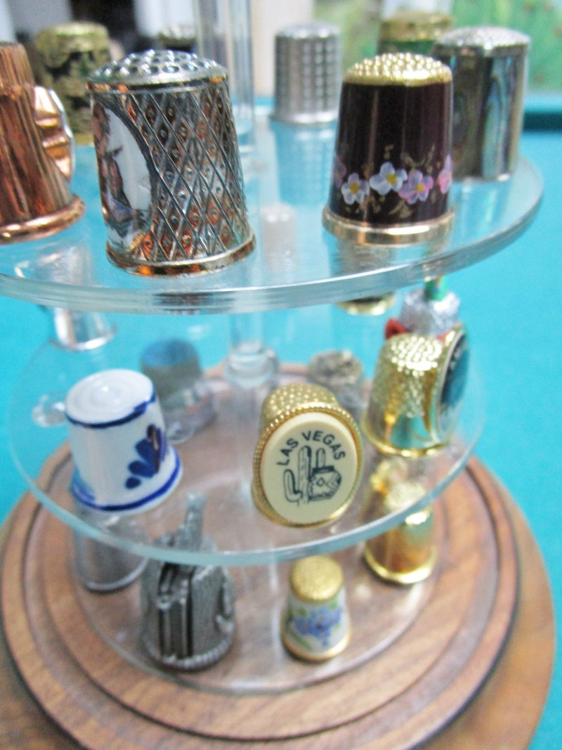 Thimbles Collection under glass dome, 43 assorted thimbles, dome is 11" tall[B]