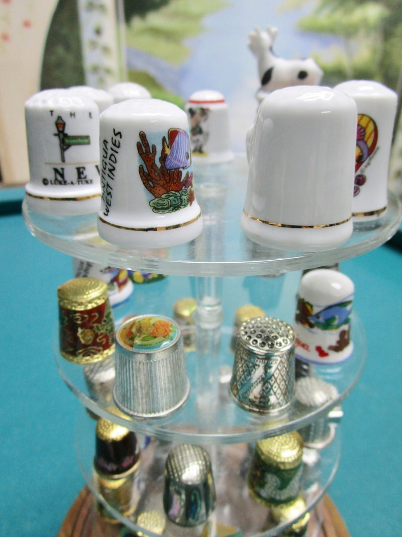 Thimbles Collection under glass dome, 43 assorted thimbles, dome is 11" tall[B]