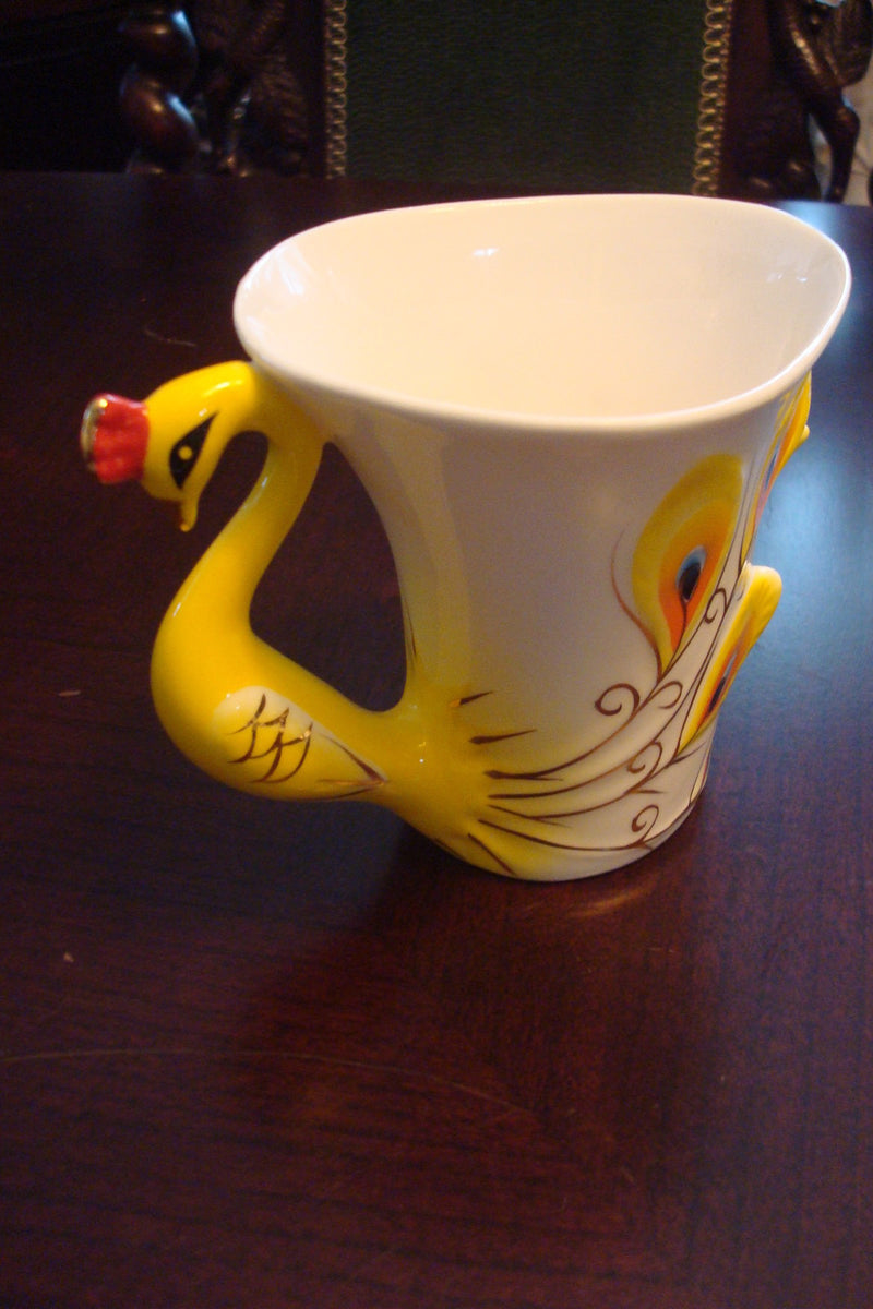 Beautiful cup and saucer from the Peacock Collection, cup ,saucer and spoon orig