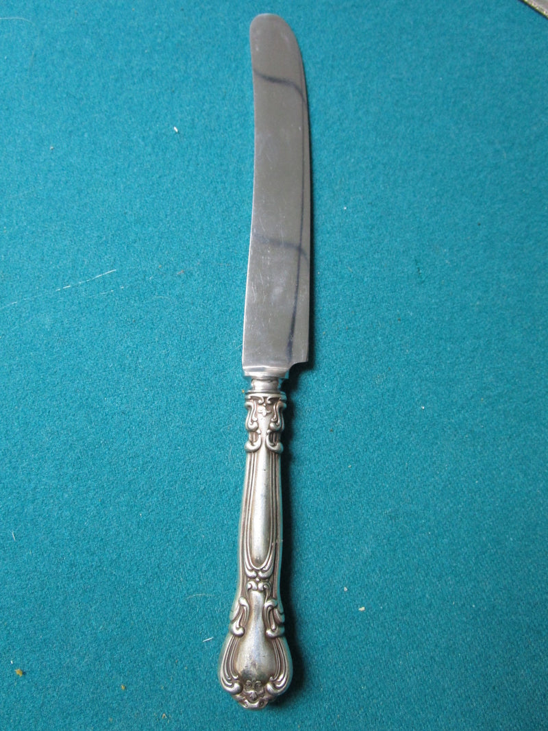 Sterling knife, silver handle