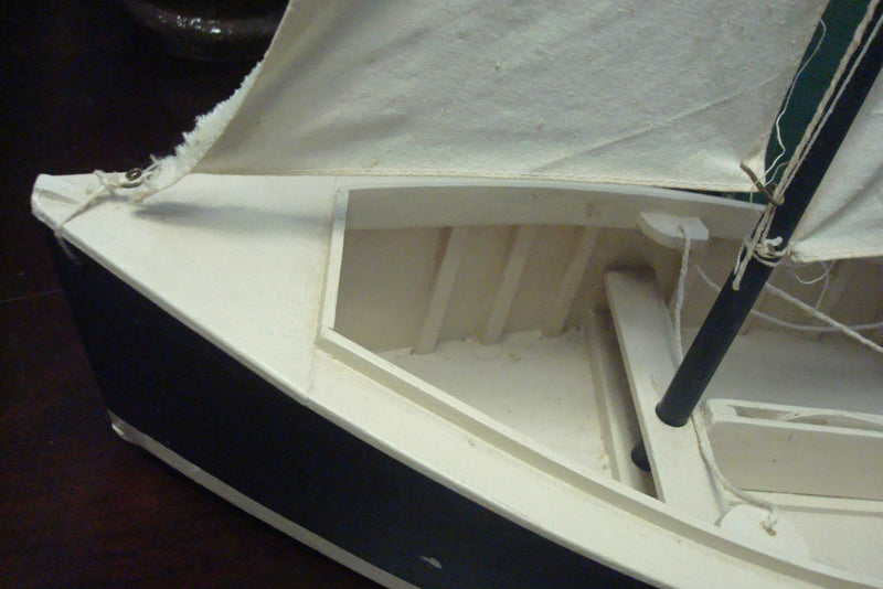Sailing wooden boat 25' by 24" by 10"[11]