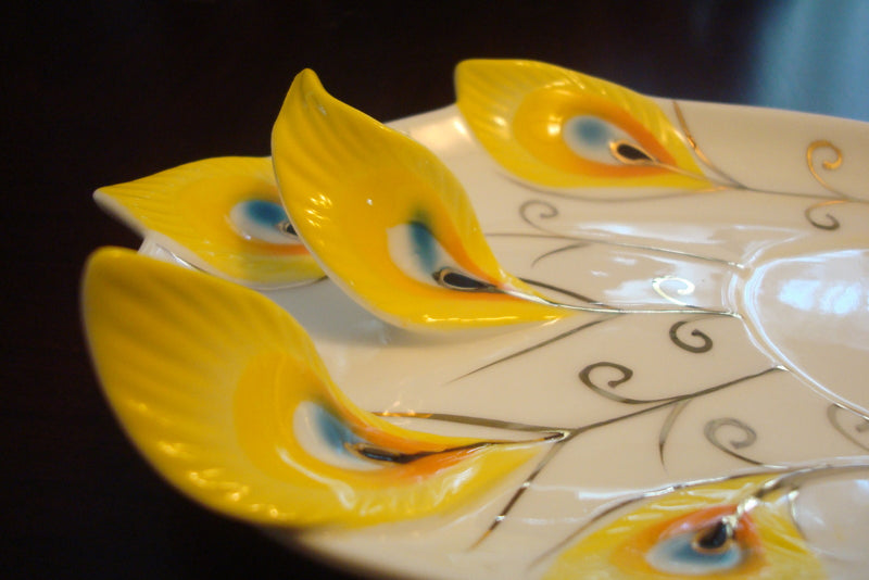 Beautiful cup and saucer from the Peacock Collection, cup ,saucer and spoon orig