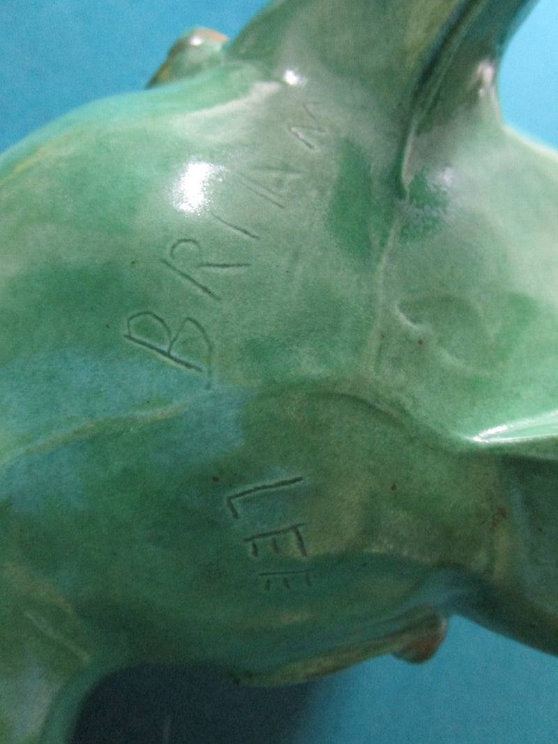 Foo dog by pottery studio signed Brian Lee, green, very detailed