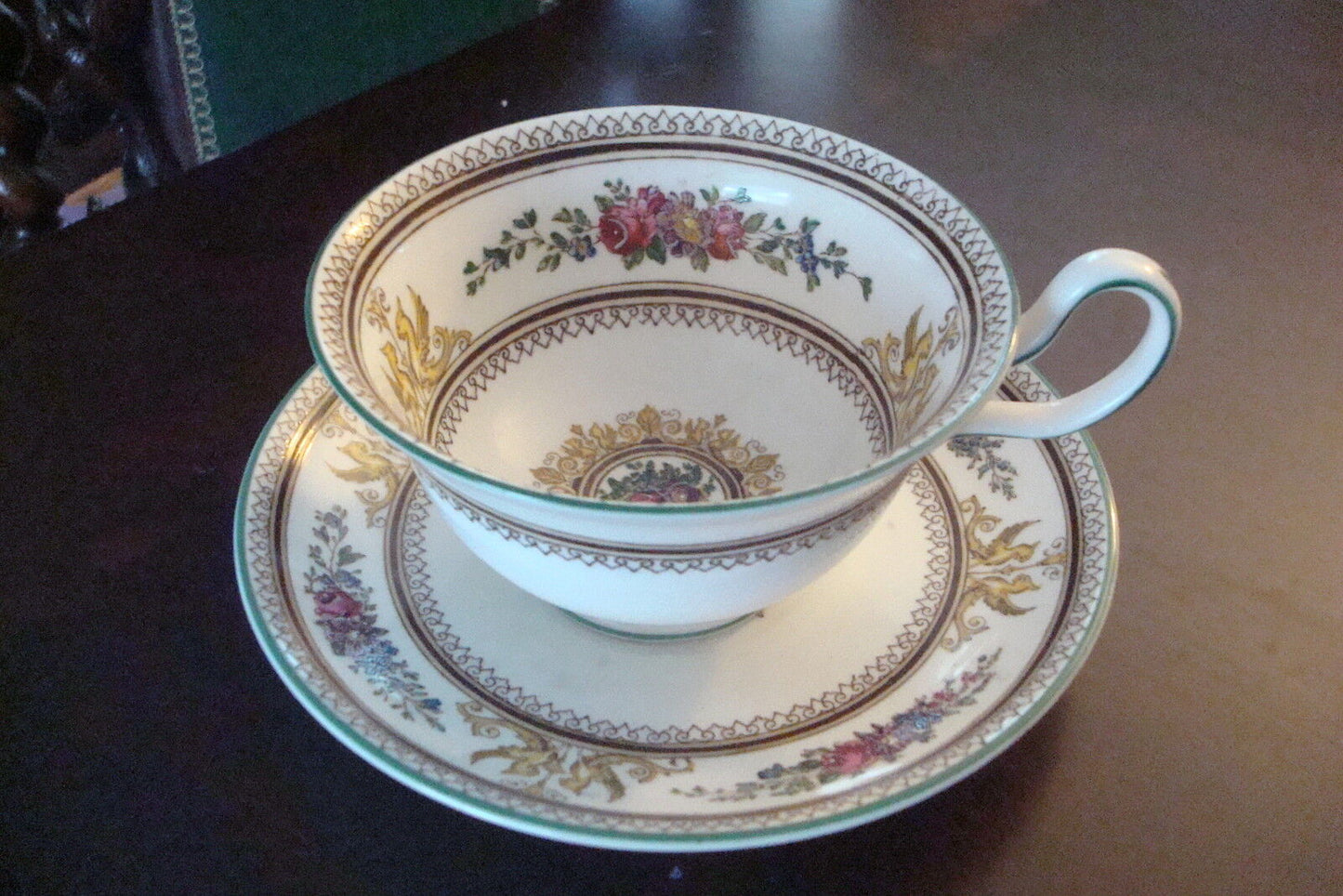 Wedgwood cup and saucer, flowers and griffons[a5#3]