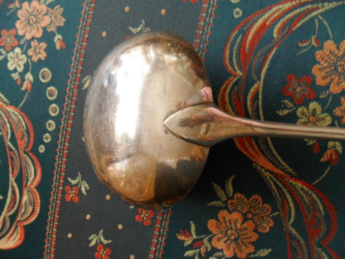 William Hutton and Sons.Silverplate soup ladle, 12"