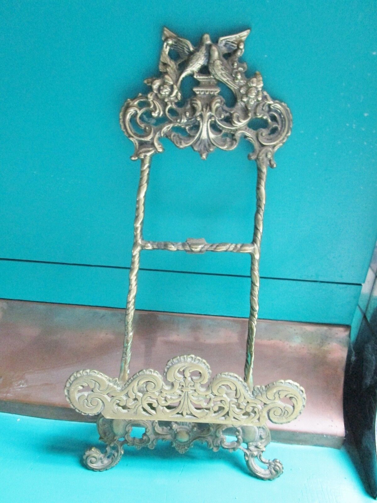 Wall brass stand, beautiful engravings with shelf for a plate or picture origina