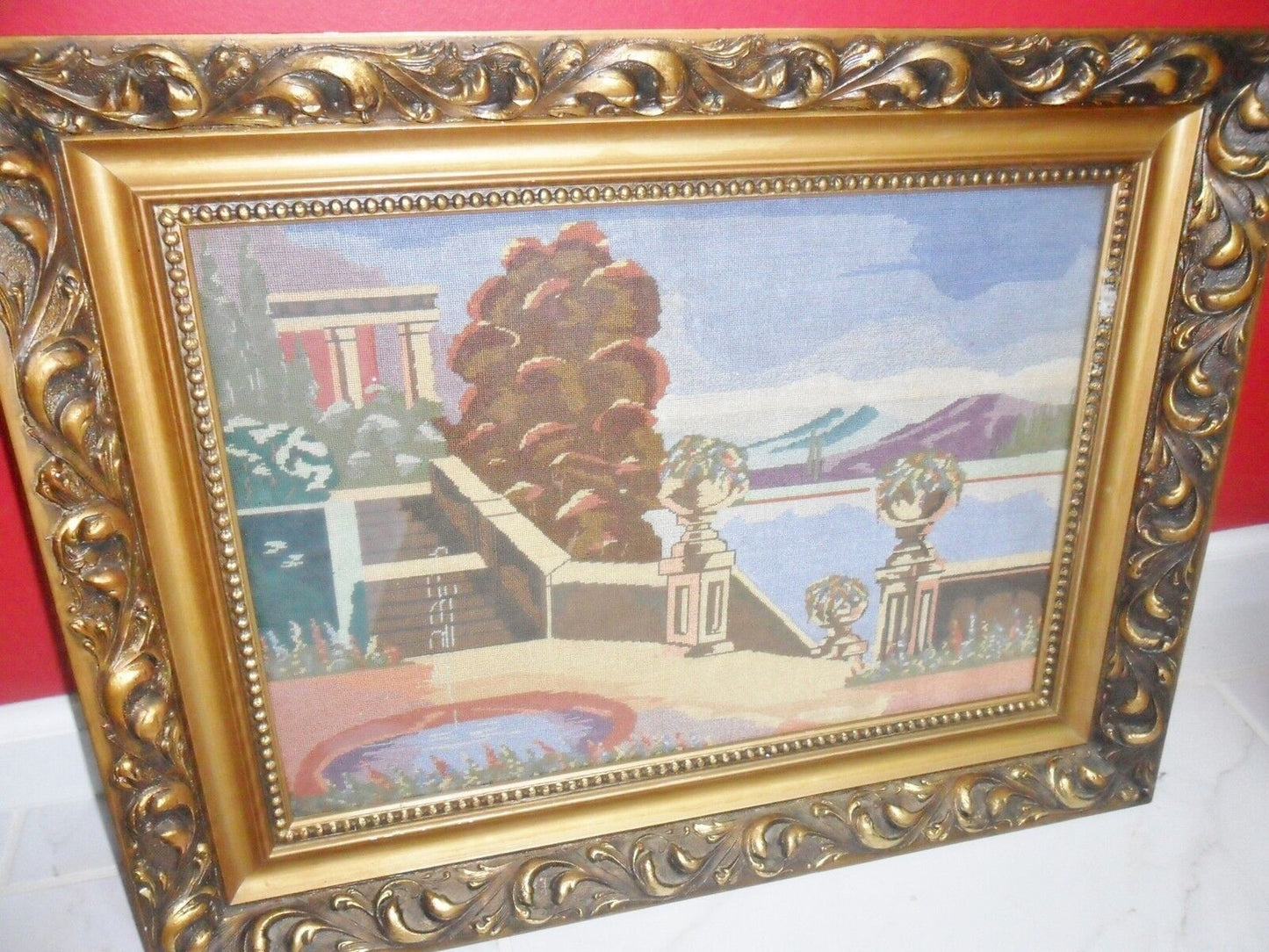 Vintage 1930s needlepoint of a villa and fountain, gorgeous frame