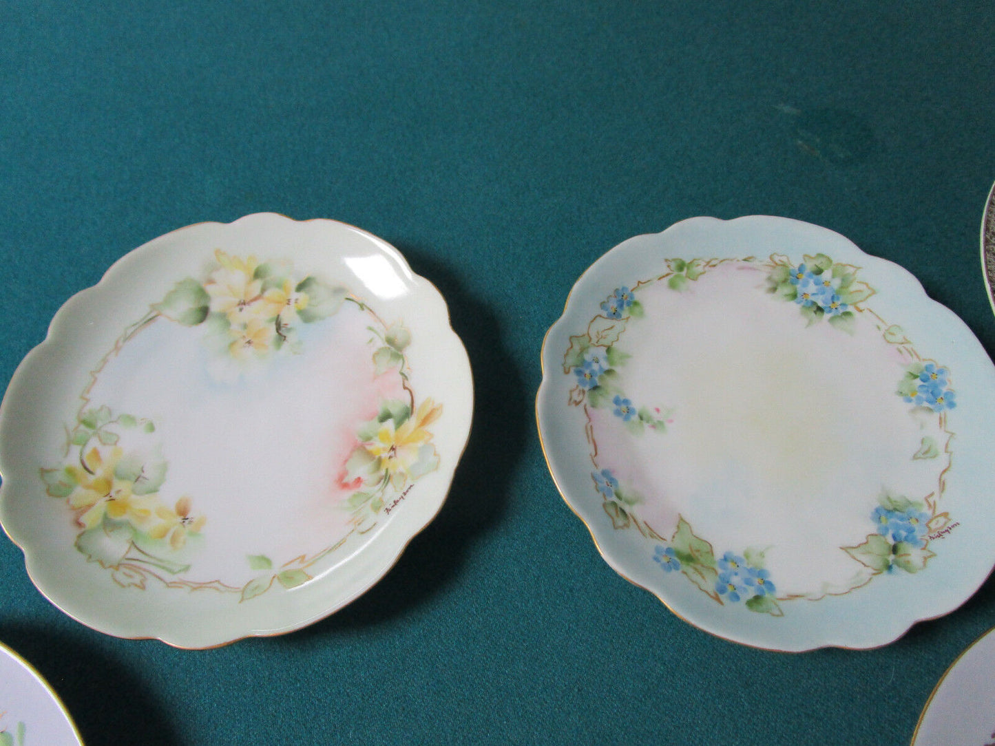 11 GERMAN SIGNED BREAD PLATES AND 2 SALAD PLATES 6" AND 8"