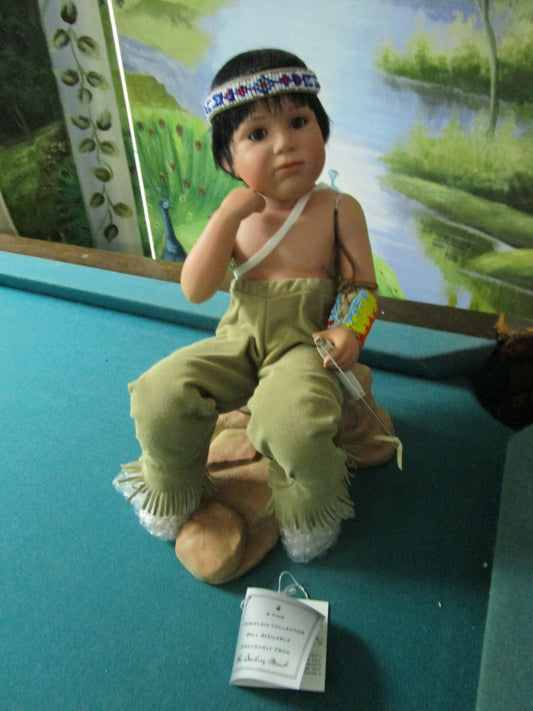 1990s DANBURY MINT DOLL LAST ARROW AMERICAN INDIAN BOY SITTING ON A ROCK