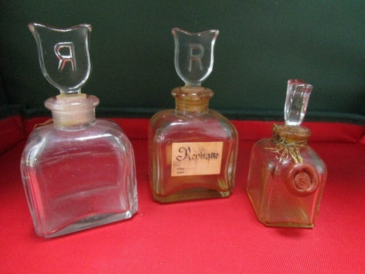 Replique 3 Empty Bottles One Still With A Seal