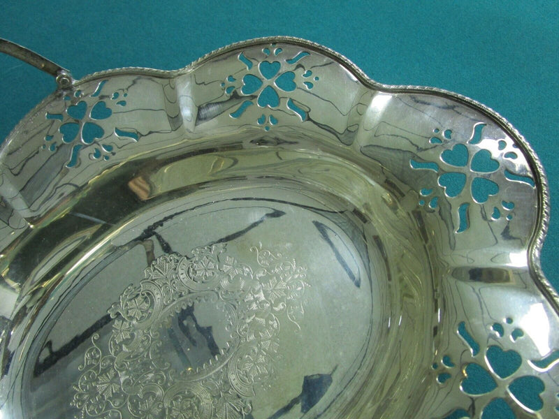 Large silverplate bridal basket with handle, gorgeous decorations footed flowers