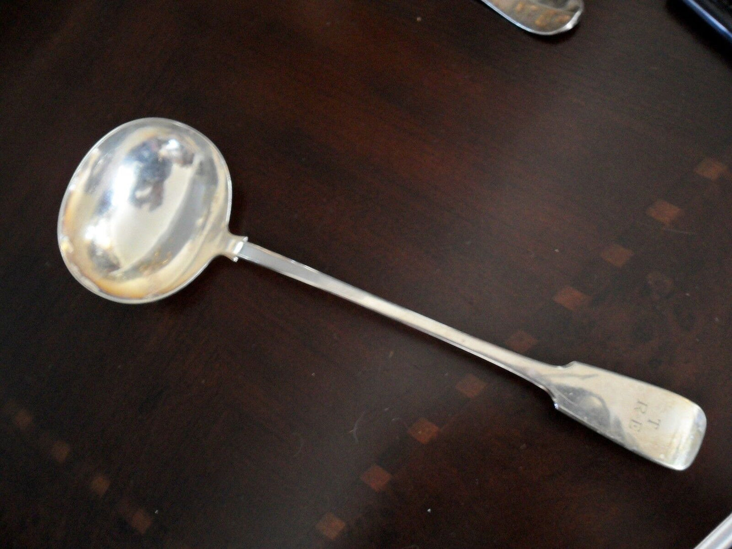 William Hutton and Sons.Silverplate soup ladle, 12"