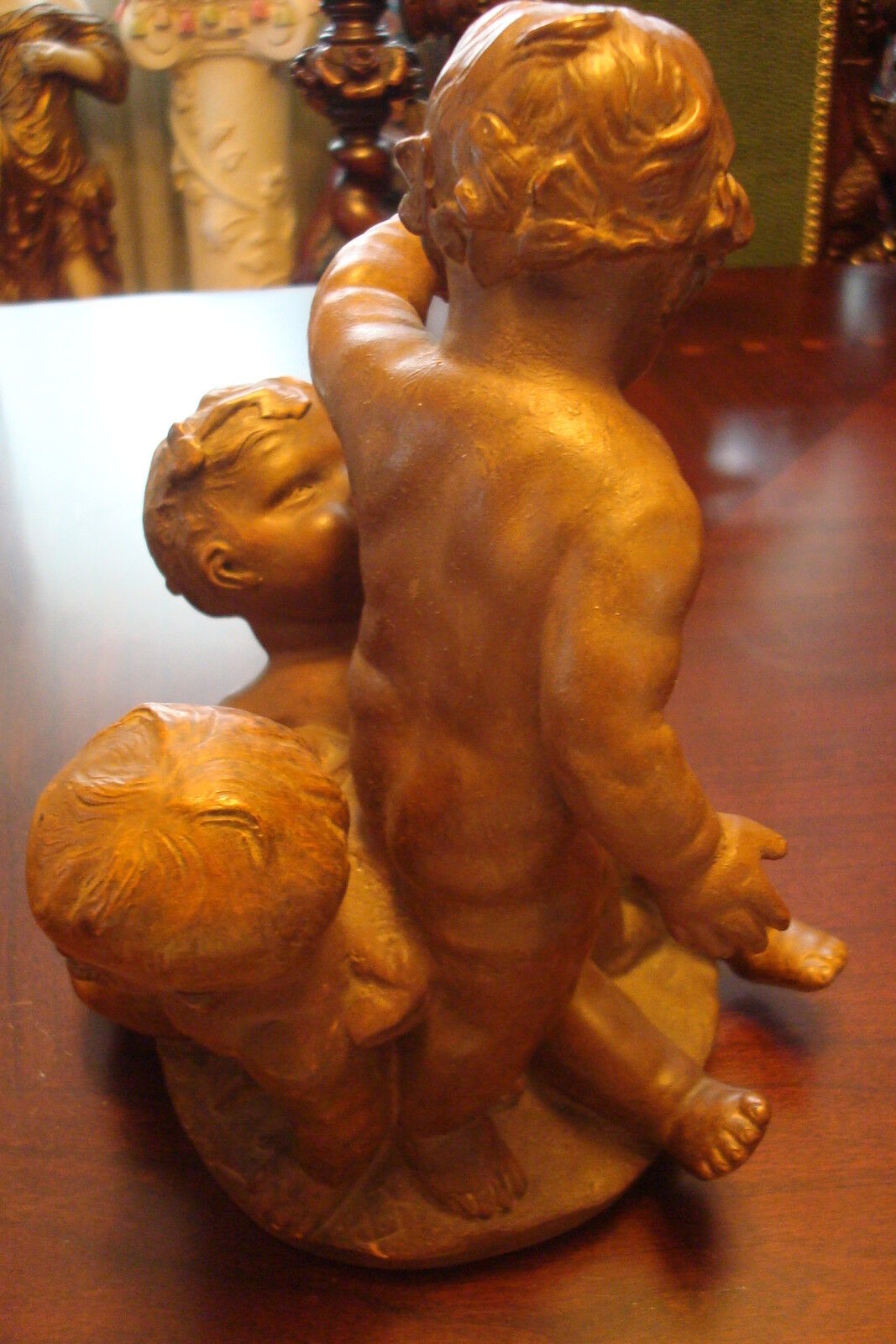 TROIS ENFANTS JOUANT terracotta cast sculpture signed on base, Louis F. de Larue