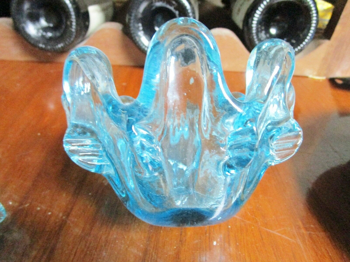 Three nesting light blue glass ashtrays, different sizes [10-color]