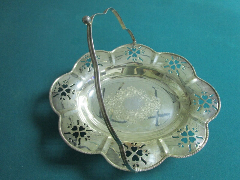 Large silverplate bridal basket with handle, gorgeous decorations footed flowers