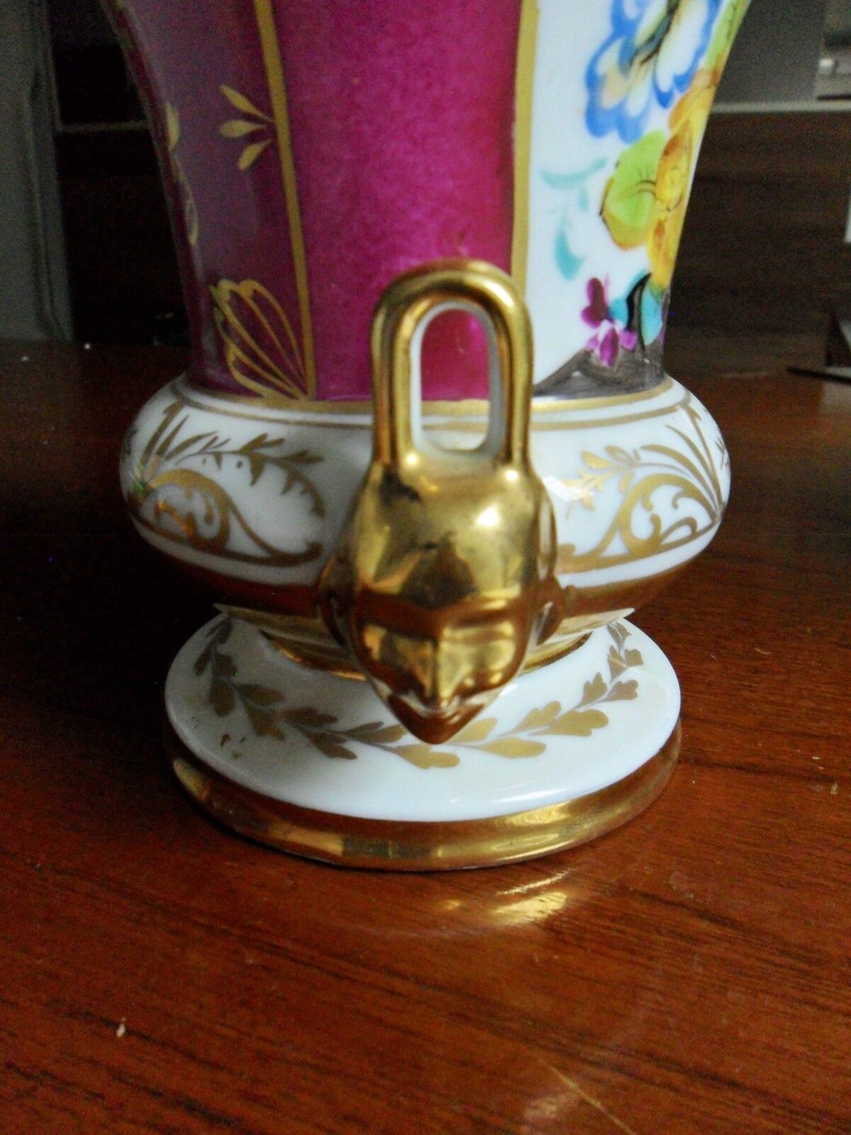 Vase made in France faces handles flowers and gold[a3]