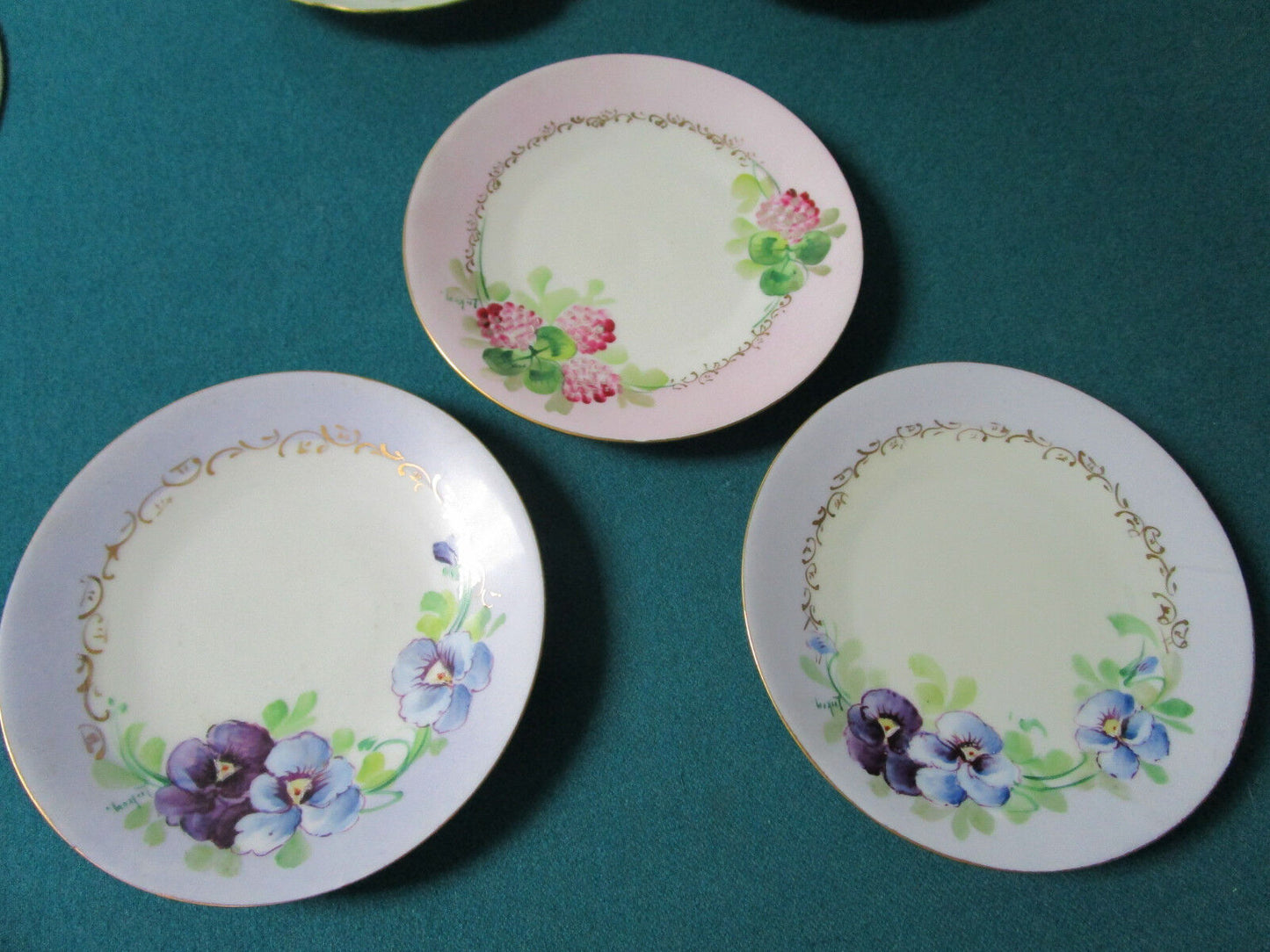 11 GERMAN SIGNED BREAD PLATES AND 2 SALAD PLATES 6" AND 8"