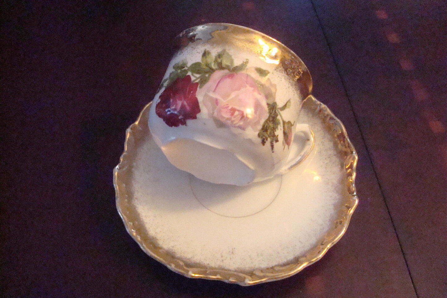 Unmarked German cup and saucer, transfer roses and gold RARE [91]