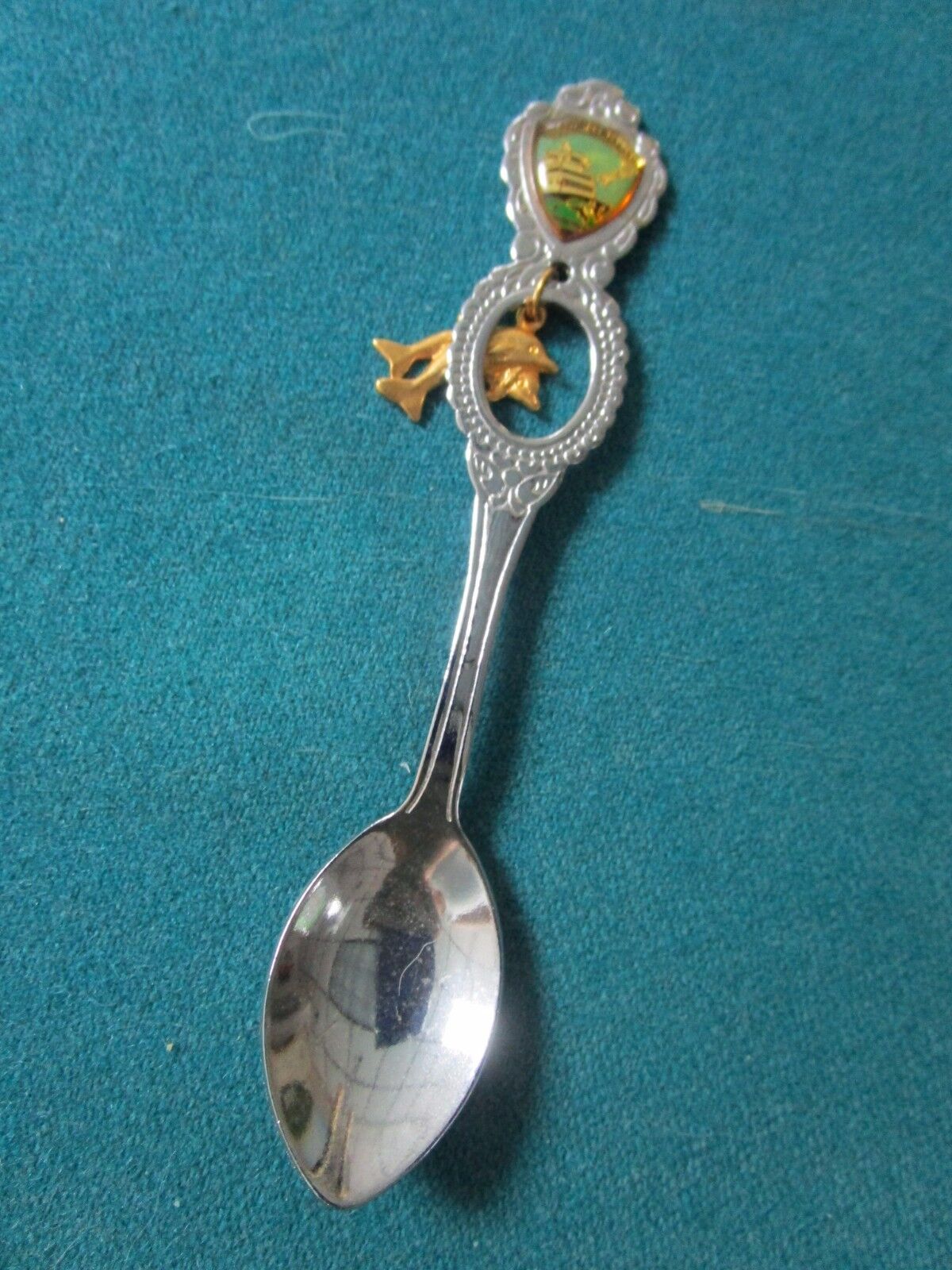 4 SOUVENIR SPOONS