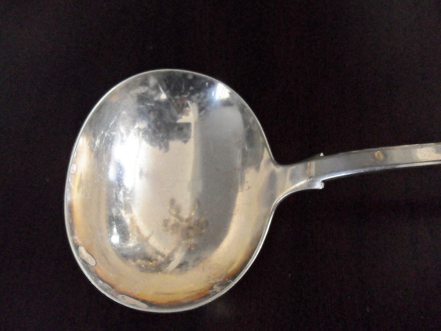 William Hutton and Sons.Silverplate soup ladle, 12"