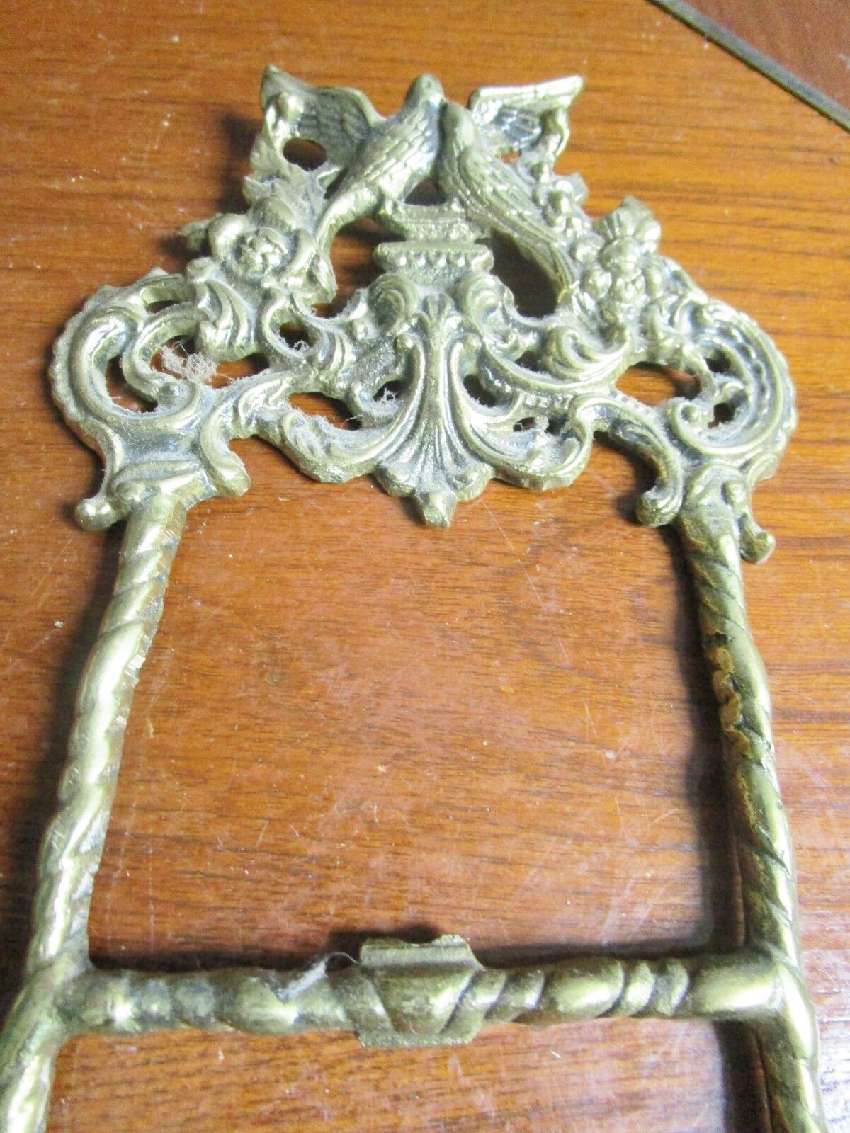 Wall brass stand, beautiful engravings with shelf for a plate or picture origina