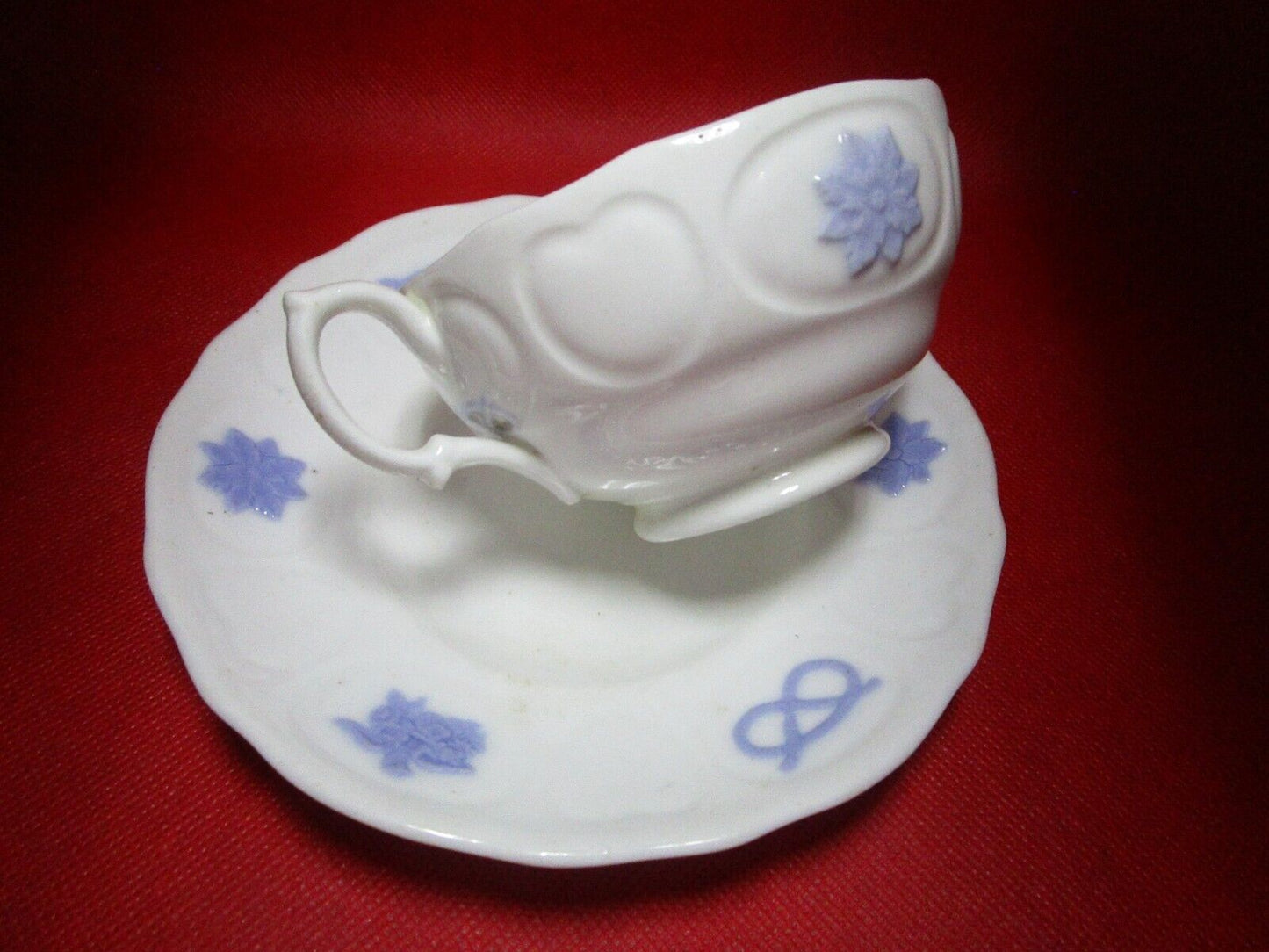 Adderley England Chelsea antique white / lavender cup and saucer anchor nots