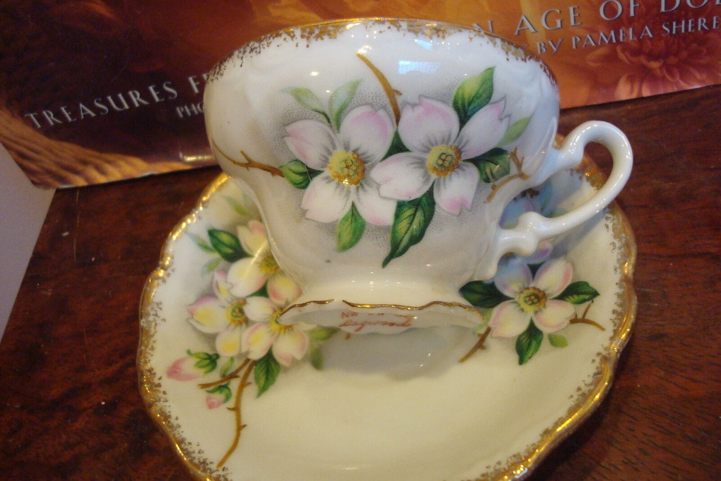 UCAGCO - Dogwood cup and saucer made in Japan, white background pink flowers