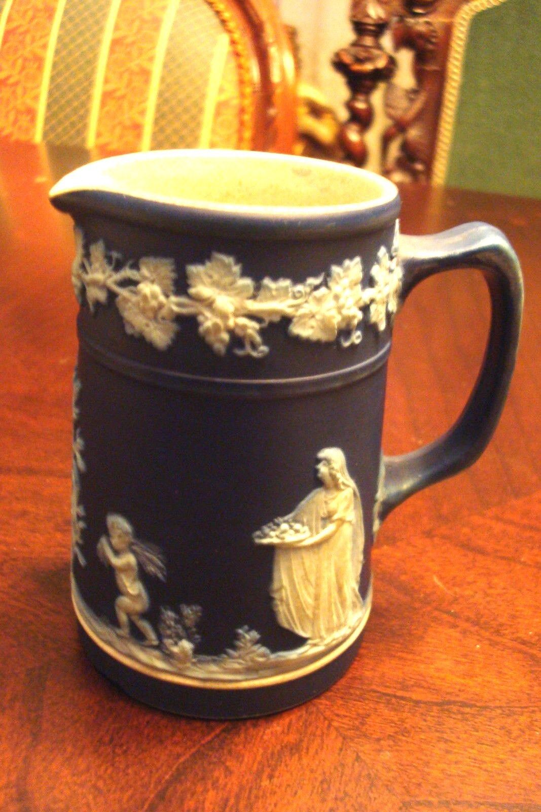 Wedgwood Dark Blue Jasperware creamer,  decorated with mythological figures[a*4w