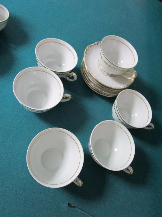 ZSOLNAY HUNGARY 6 CUPS AND SAUCERS WHITE CREAM/GOLD ACCENT, 1960s