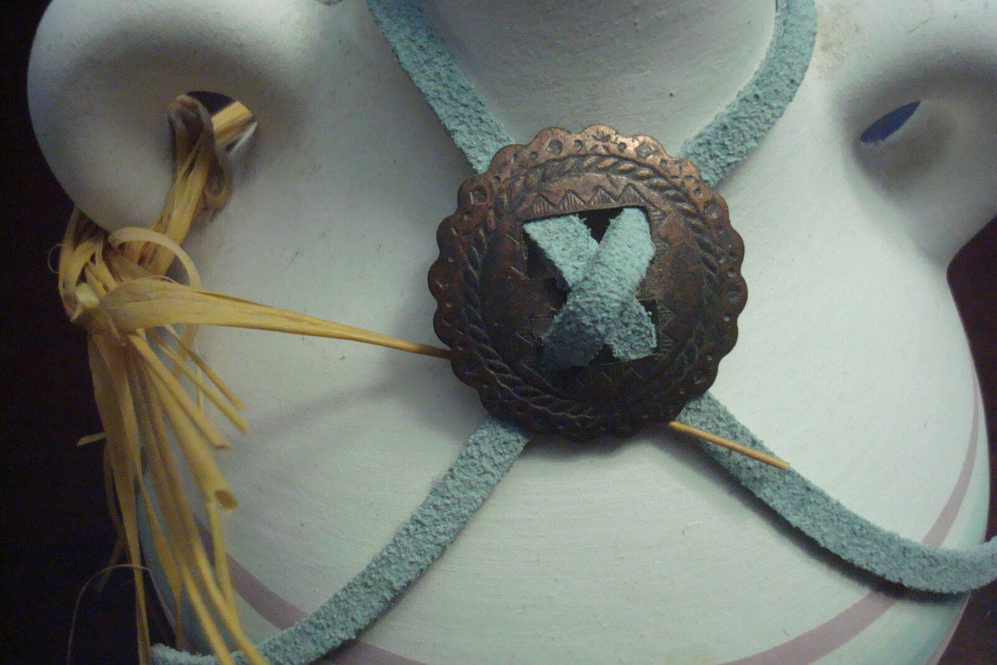 American Indian Pottery canteen with leather and medallion,unmarked, numbered