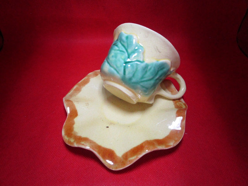 Italian pottery Majolica tea cup and saucer yellow ^^^^