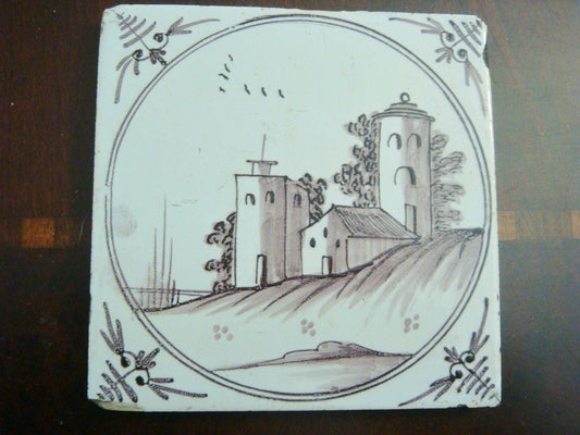 18th century salvaged Delft manganese tile with depictions of country buildings