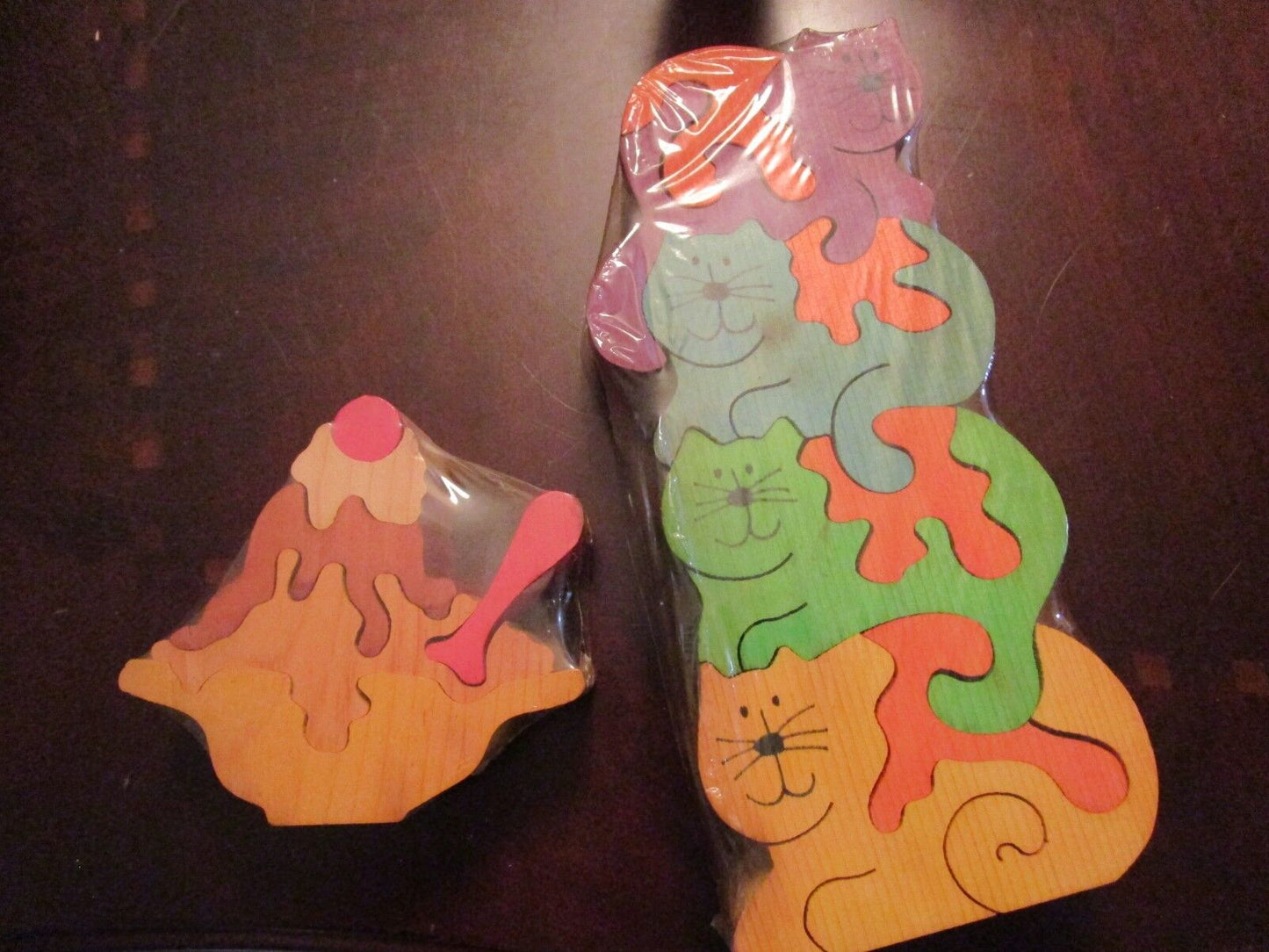 1986 PAIR OF WOODEN PUZZLES SIGNED BY ARTIST NEW  original