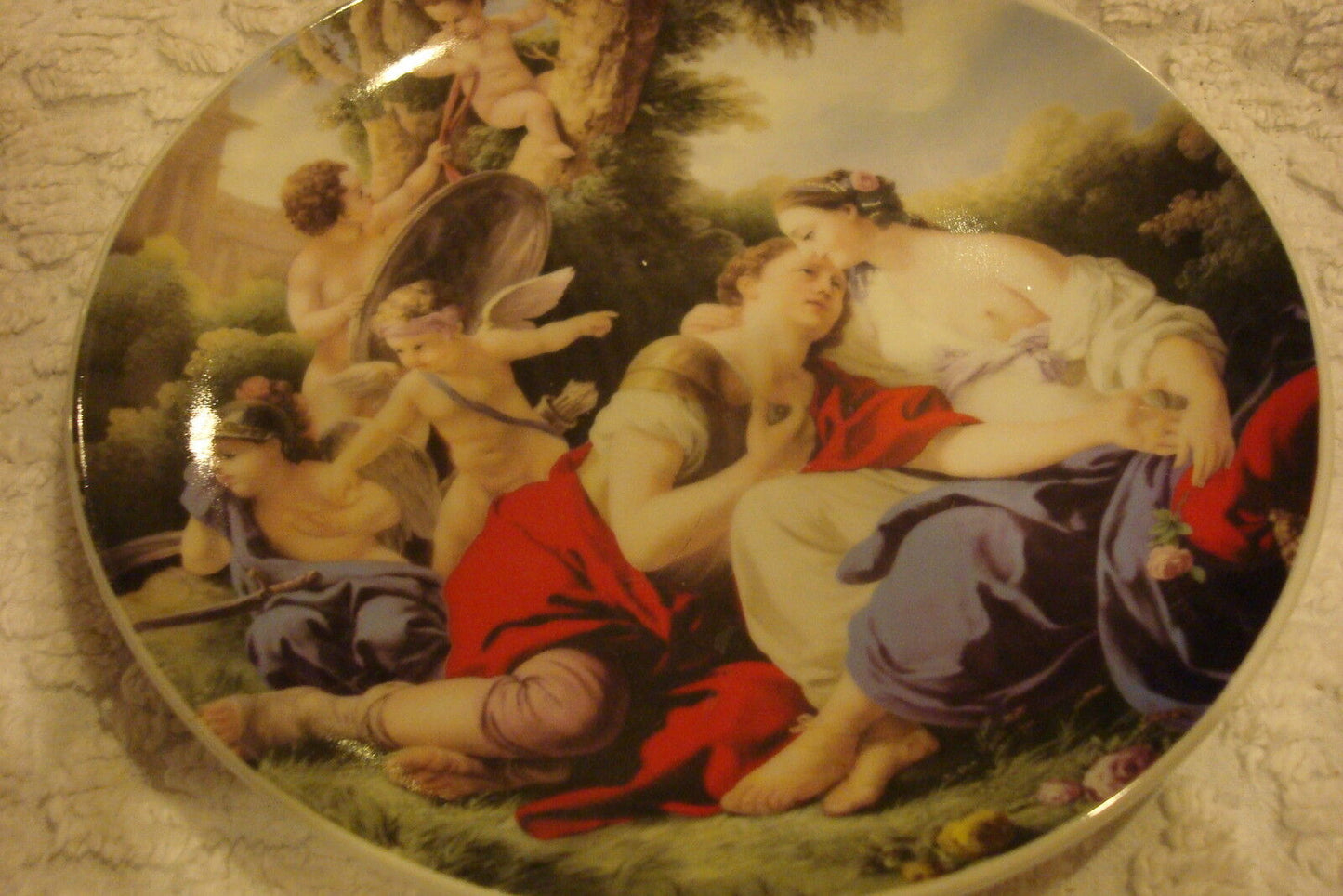 Unmarked collector plate decorated with classical Greek figures and theme, 7"