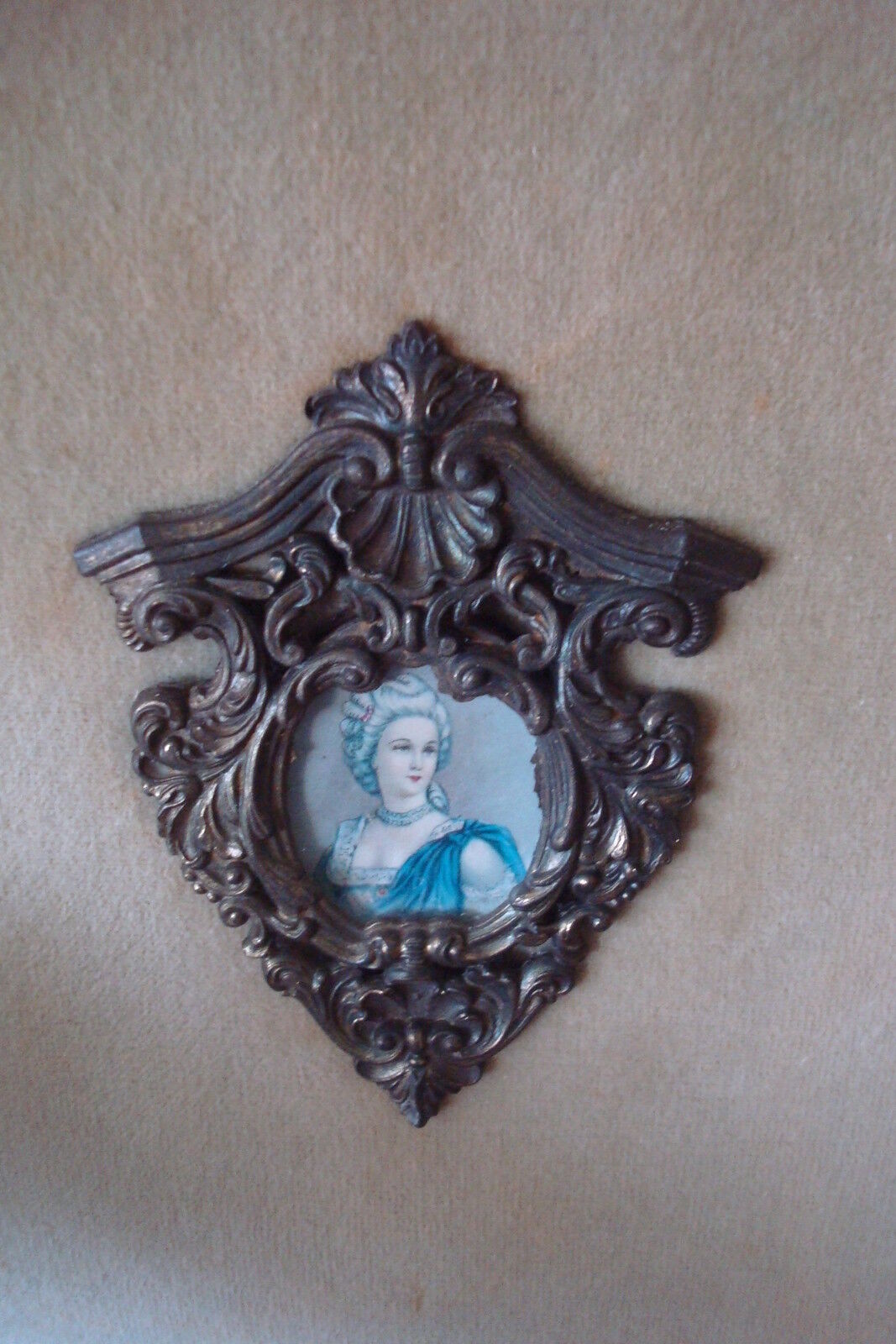 Velvet and cameos, beautiful cameos on a beige velvet in wooden frame. 36 "