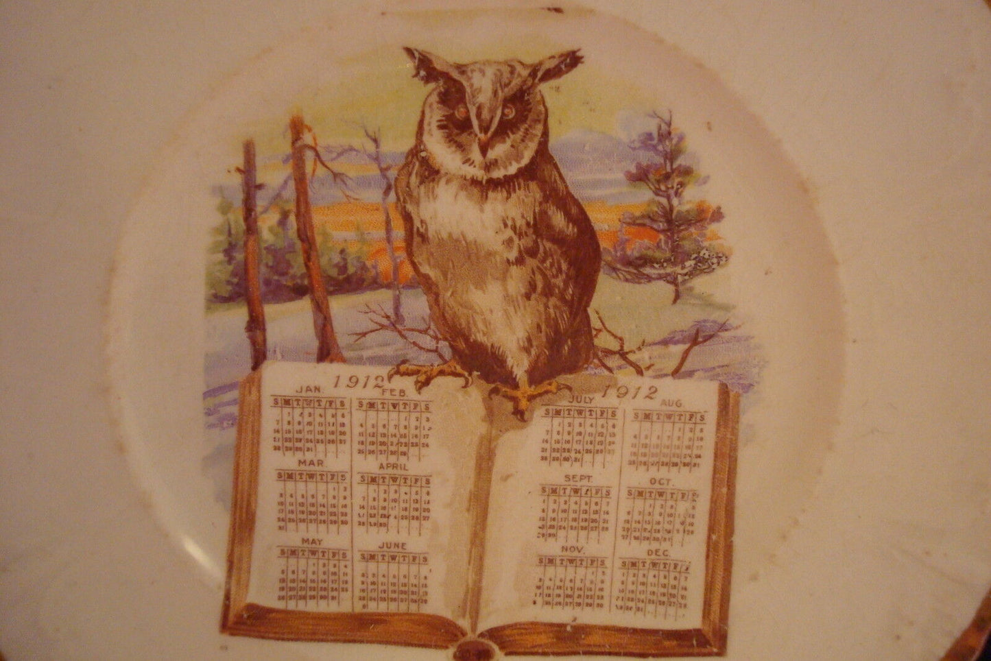 Unmarked Calendar plate 1912, molded, gold rim, Owl.