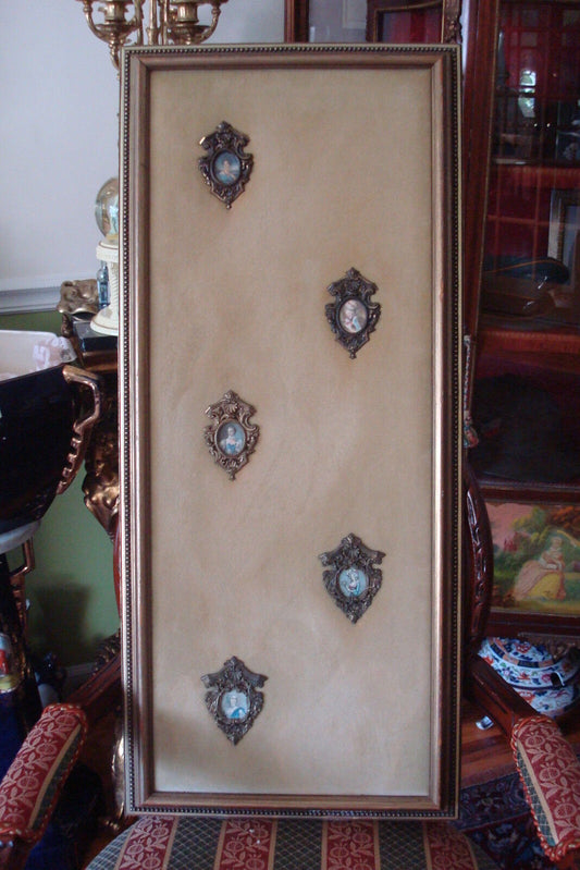 Velvet and cameos, beautiful cameos on a beige velvet in wooden frame. 36 "