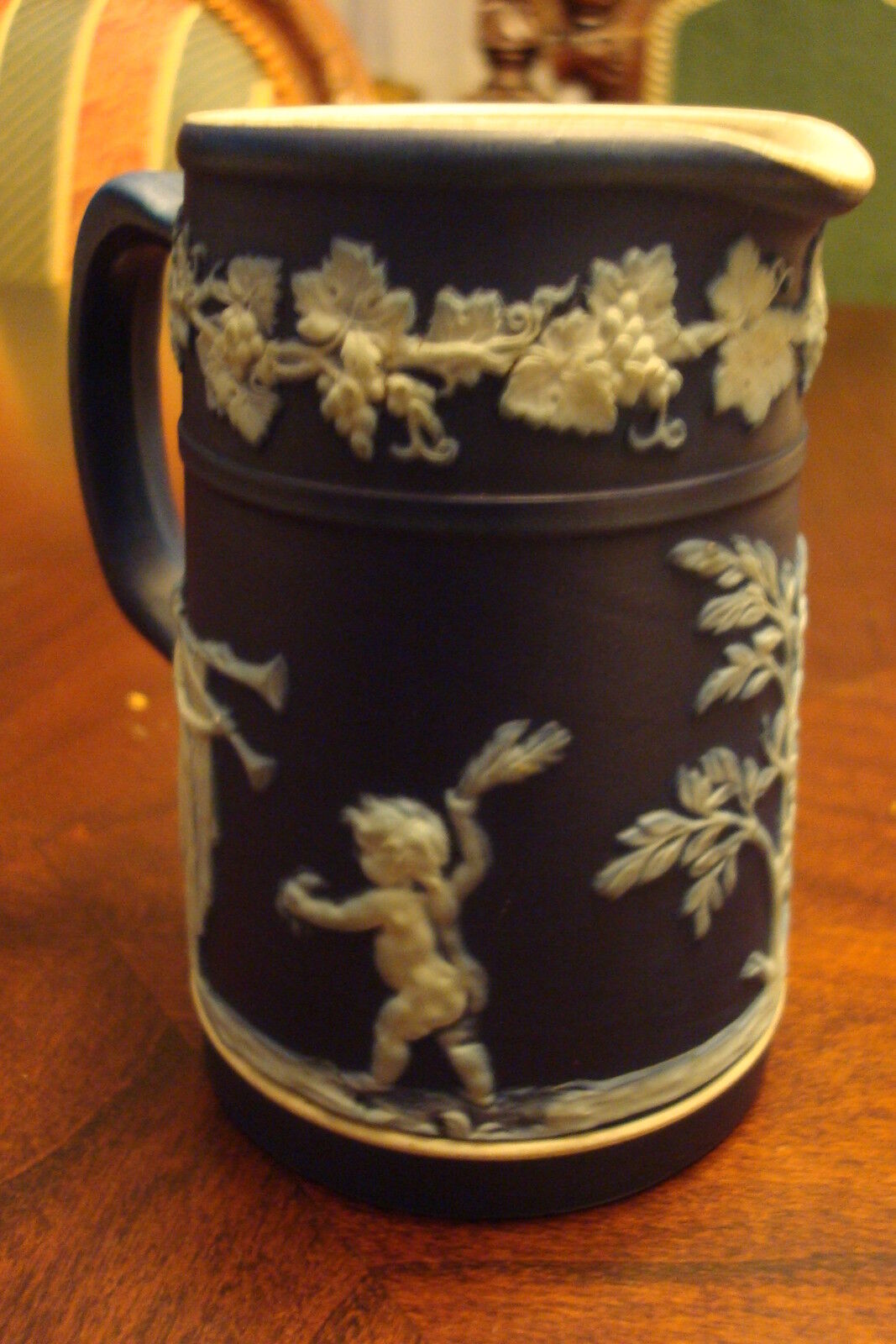 Wedgwood Dark Blue Jasperware creamer,  decorated with mythological figures[a*4w