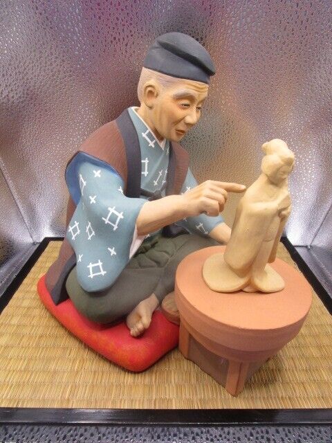 Vintage Hakata Urasaki Doll potter Clay Figurine 9 x 9 x 6" in ratan base