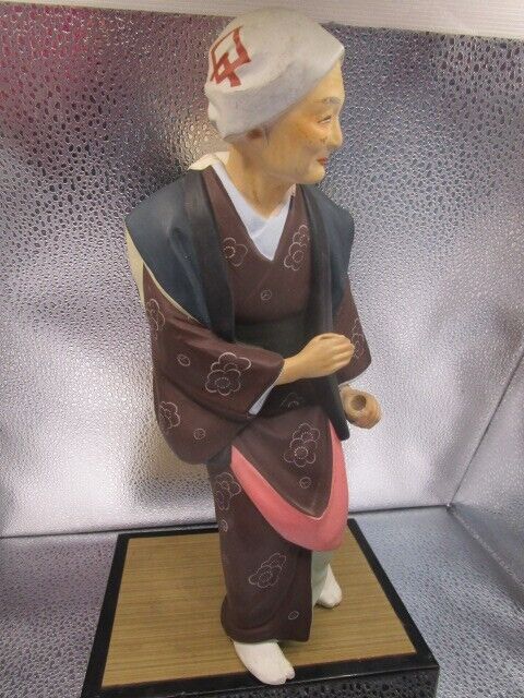 Vintage Hakata Urasaki old lady Clay Figurine 11 1/2" in ratan base